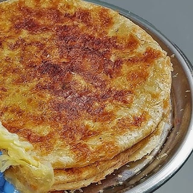 Slice of Egyptian Croissant (Feteer Meshaltit).