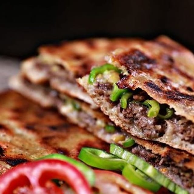 Hawawshy (Ground Beef in Pita Bread) 2 Sandwiches.